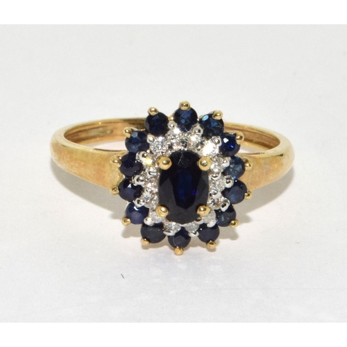 258 - 9ct gold ladies Diamond and Sapphire cluster ring size P