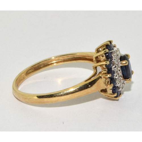 258 - 9ct gold ladies Diamond and Sapphire cluster ring size P