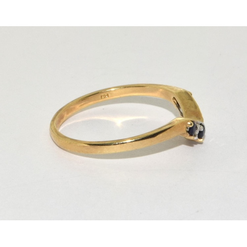 195 - 9ct gold ladies V shape Diamond and sapphire ring size O