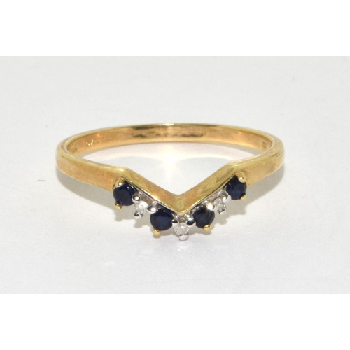 195 - 9ct gold ladies V shape Diamond and sapphire ring size O