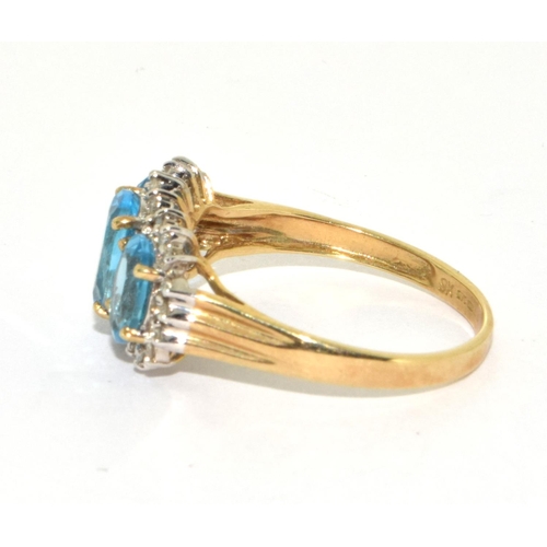 192 - 9ct gold ladies Diamond and Triple Blue Topaz ring size S