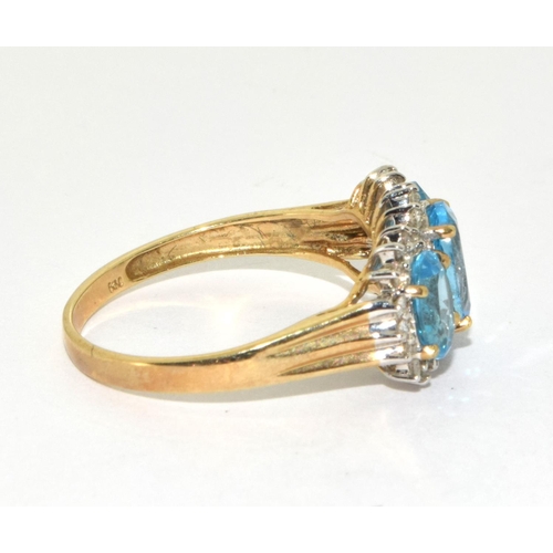 192 - 9ct gold ladies Diamond and Triple Blue Topaz ring size S