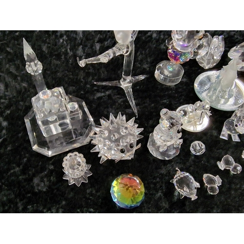 78 - A quantity of Swarovski glass items to include animals.