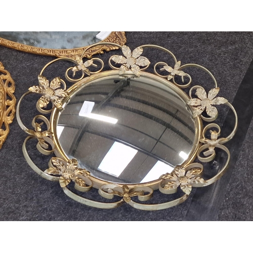 81 - Three vintage gilded wall mirrors of varying sizes.