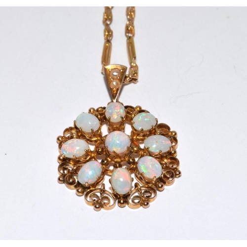 332 - 9ct gold Opal pendant necklace set together a fancy link gold chain