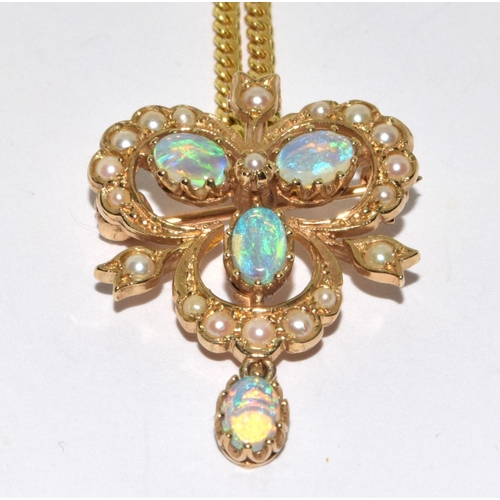 299 - 9ct gold ladies Opal and Pearl necklace/brooch set on a gold chain shaped as a clover leaf