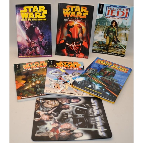 63 - A collection of Star Wars graphic comic strips and pop up books to include Dark Horse, Lucas Publica... 