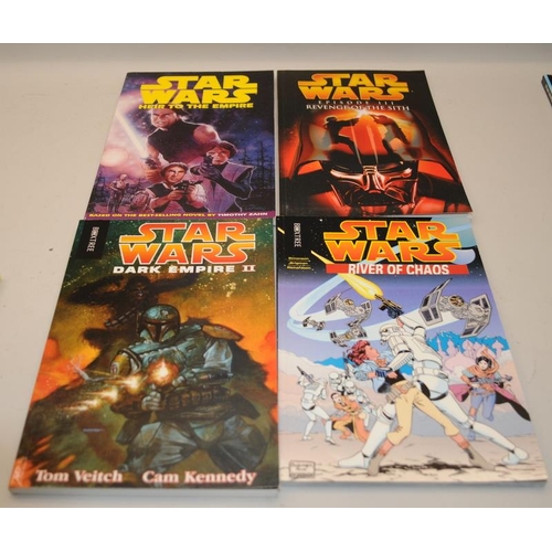 63 - A collection of Star Wars graphic comic strips and pop up books to include Dark Horse, Lucas Publica... 