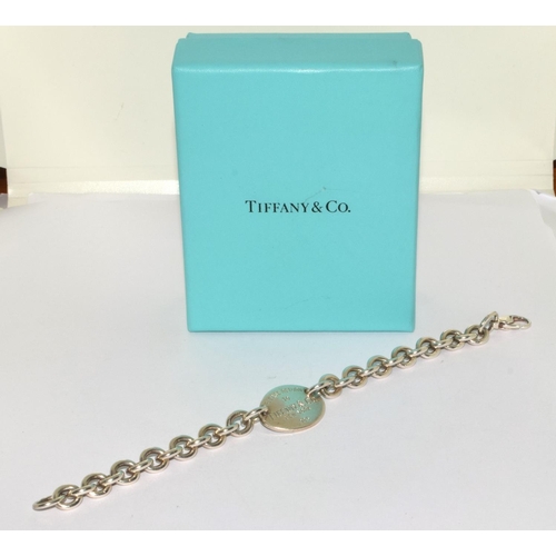 293 - Tiffany & Co fully hallmarked silver bracelet with box.