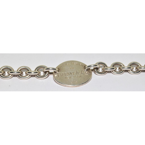 293 - Tiffany & Co fully hallmarked silver bracelet with box.