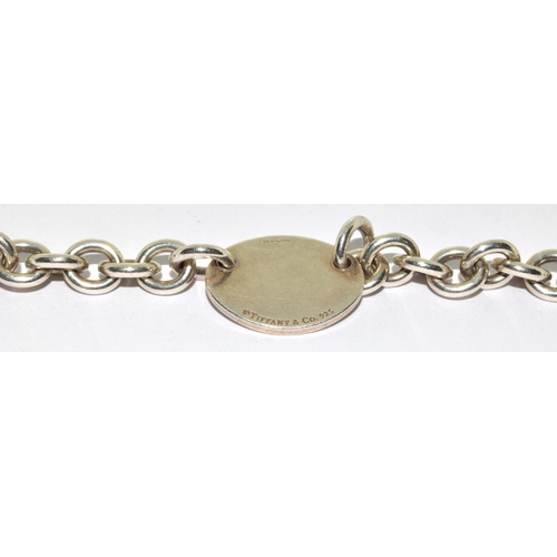 293 - Tiffany & Co fully hallmarked silver bracelet with box.