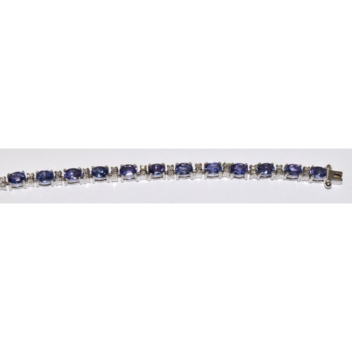 297 - Tanzanite 9ct white gold bracelet 7.4g (boxed)