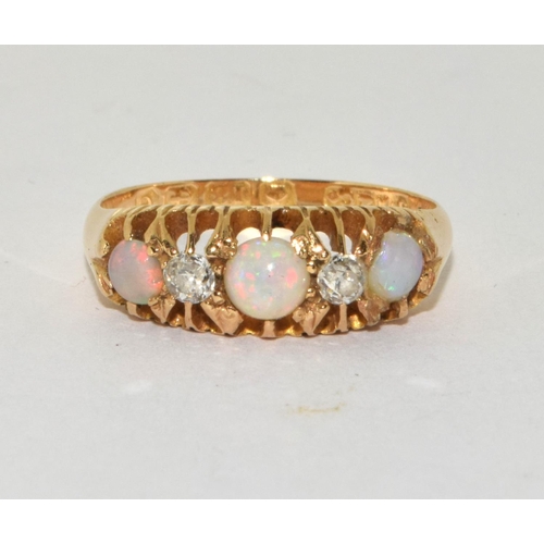 220 - Fire opal, diamond antique 18ct fully hallmarked ring, 2.9g, Size M