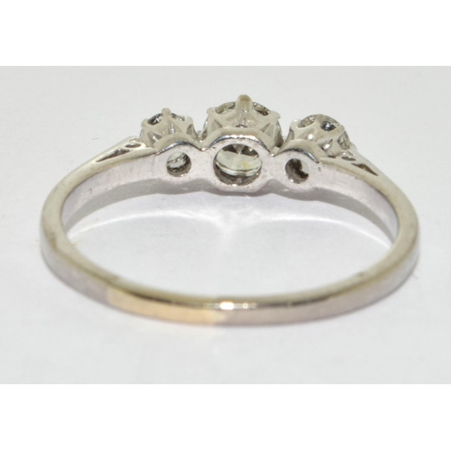 386 - A Diamond 3 stone ring centre approx. 0.50 point sides approx 0.25 each total approx 1.00ct set in 1... 