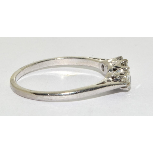 386 - A Diamond 3 stone ring centre approx. 0.50 point sides approx 0.25 each total approx 1.00ct set in 1... 