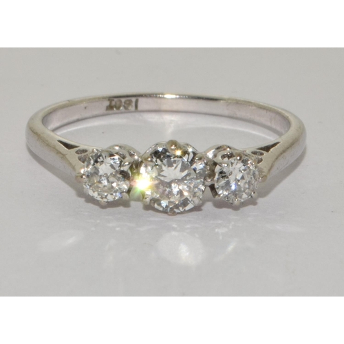 386 - A Diamond 3 stone ring centre approx. 0.50 point sides approx 0.25 each total approx 1.00ct set in 1... 