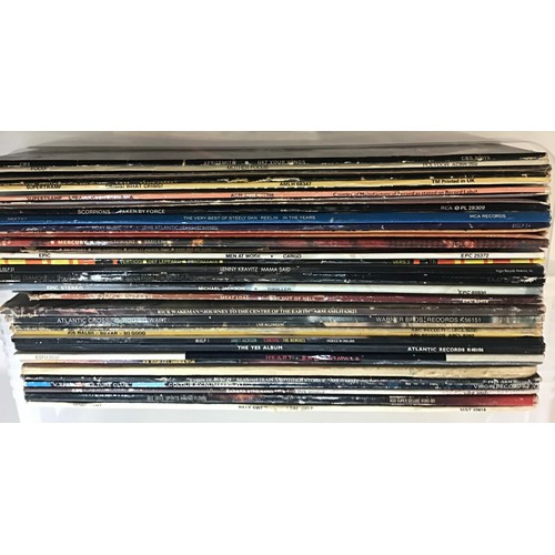 303 - BOX OF ROCK AND POP VINYL RECORDS. Here we find titles from - Aerosmith - Yes - Meatloaf - Bee Gees ... 