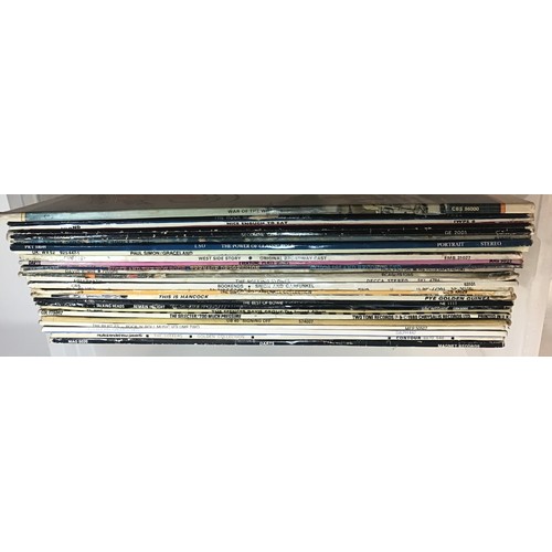 310 - ROCK AND POP BOX OF VINYL RECORDS. Artists here include - Rolling Stones - David Bowie - Darts - Nic... 