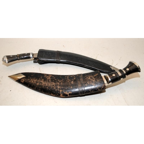 133 - 2 x vintage Kukri's in scabbards c/w Chakmaks and Kardas.