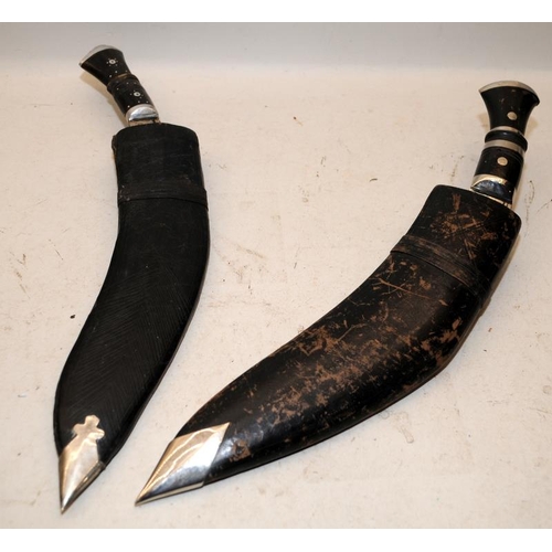 133 - 2 x vintage Kukri's in scabbards c/w Chakmaks and Kardas.