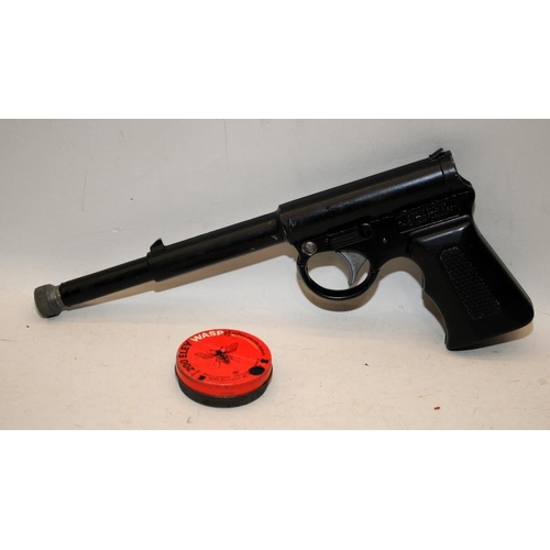 136 - Vintage TJ Harrington .177 Spring  Air Pistol c/w a small quantity of pellets and darts. Cocks and d... 