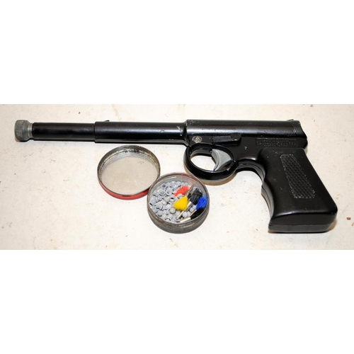 136 - Vintage TJ Harrington .177 Spring  Air Pistol c/w a small quantity of pellets and darts. Cocks and d... 