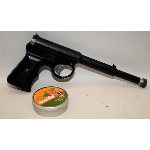 145 - Vintage TJ Harrington .177 Spring  Air Pistol c/w a small quantity of pellets and darts. Cocks and d... 