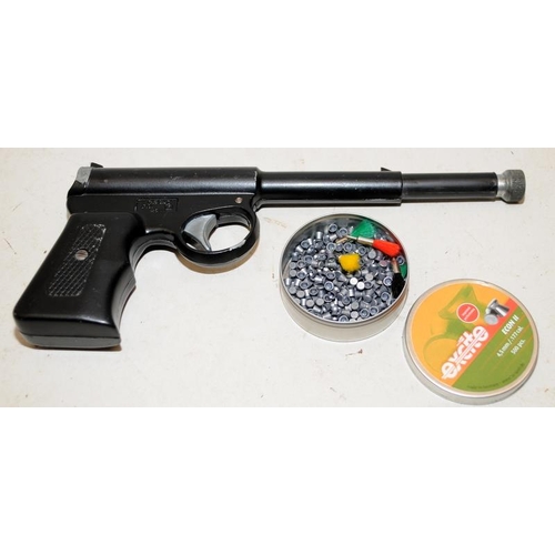 145 - Vintage TJ Harrington .177 Spring  Air Pistol c/w a small quantity of pellets and darts. Cocks and d... 