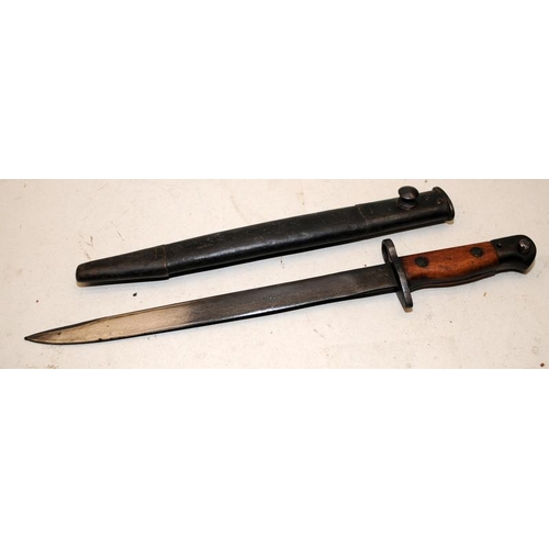 154 - WWII era German military (?) bayonet marked WR 43, with scabbard. Additional note added 05/12: It ha... 