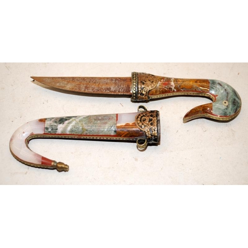 167 - Ceremonial curved dagger, the handle and scabbard covered in polished agates. Some losses to scabbar... 