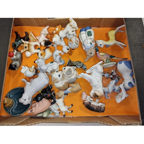 101 - Two trays of vintage porcelain ornaments to include Geobel Monks, Honiton etc.