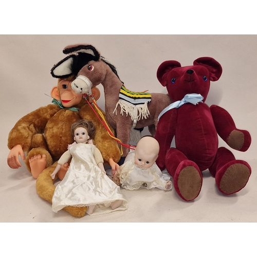 104 - Group of vintage soft toys to include Merrythought Donkey together with two bisque dolls one of whic... 