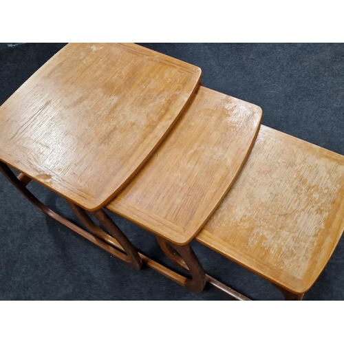 393 - Nathan Burlington  mid century C1960s nest of 3 teak tables with bow legs and banded top largest bei... 