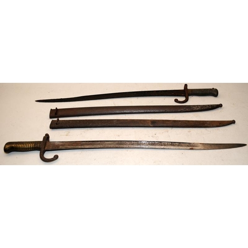 134 - 2 x French 19th century Chassepot Bayonets with scabbards, one won't come out of scabbard