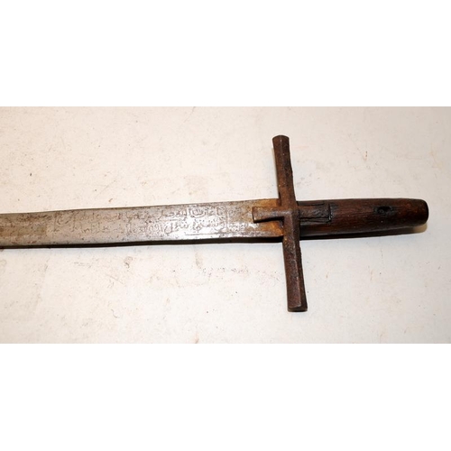 157 - Antique long sword with iron cross piece and wooden grip. Possibly Omdurman period Sudanese