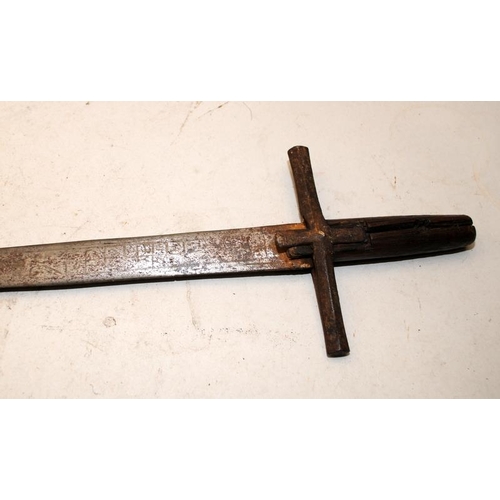 157 - Antique long sword with iron cross piece and wooden grip. Possibly Omdurman period Sudanese