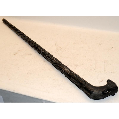 511 - Vintage African ebonised hardwood walking cane with carved decoration and an elephant handle