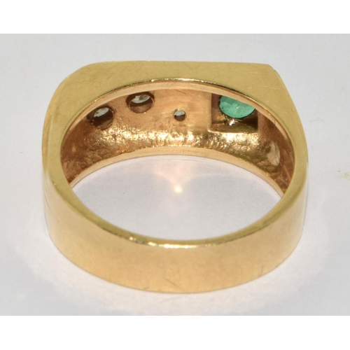 350A - A substantial Y/G emerald and diamond ring. Size U