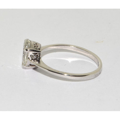 387 - An 18ct W/G pear shaped Diamond ring. Size M