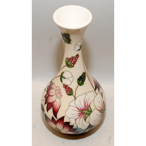 486 - Moorcroft Bramble pattern bottle vase. 24cms tall