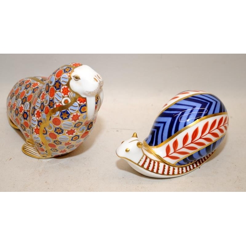 493 - 4 x Royal Crown Derby paperweights, Walrus, Penguin, Snail and Wren.