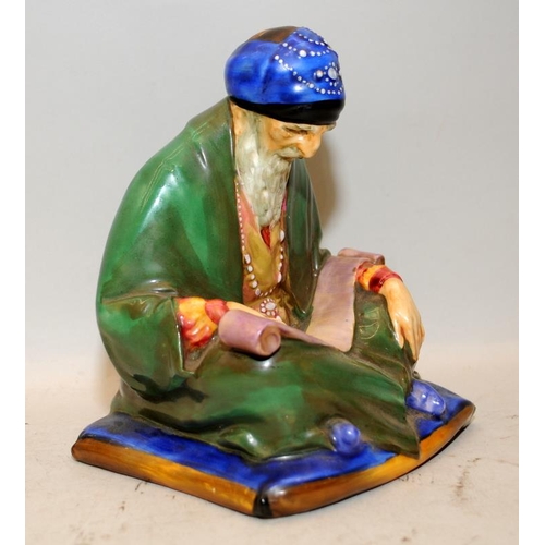 499 - Rare early Royal Doulton figure 'A Scribe' HN305. 17cms tall