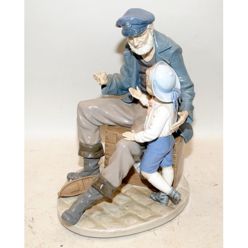 500 - LLadro A Tall Yarn old sailor with a boy tableau 5207, retired. Boat needs reattaching. 29cms