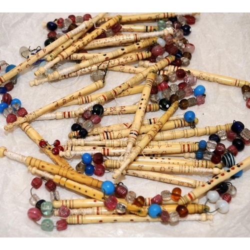 503 - Good collection of beaded bone lace making bobbins, most named or with mottos