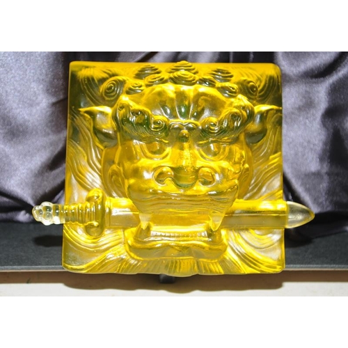 490 - Quality Chinese pressed glass paperweight in opaque golden colour featuring a Dog of Fo with a sword... 