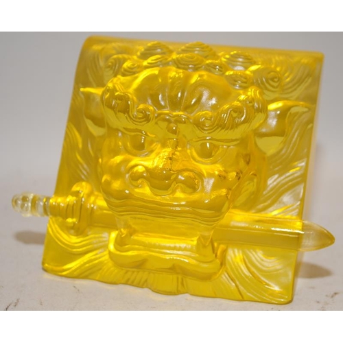 490 - Quality Chinese pressed glass paperweight in opaque golden colour featuring a Dog of Fo with a sword... 