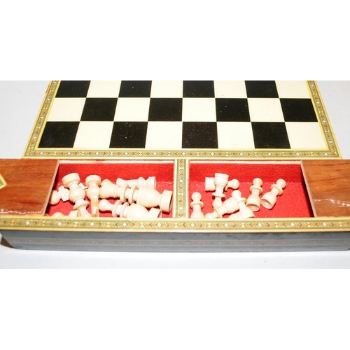 504 - Quality vintage wooden chess set presented in a folding wooden case decorated in the Sorrento style,... 