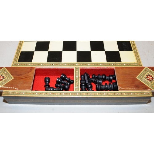 504 - Quality vintage wooden chess set presented in a folding wooden case decorated in the Sorrento style,... 