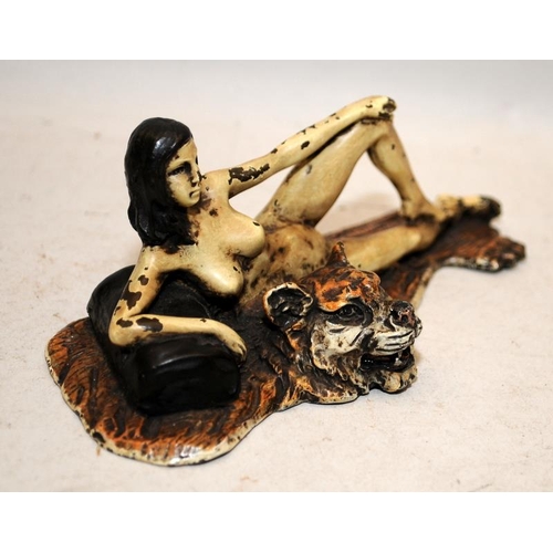 512 - Antique cold painted bronze of a reclining nude on a tiger rug. 15cms across. Signature in reverse t... 