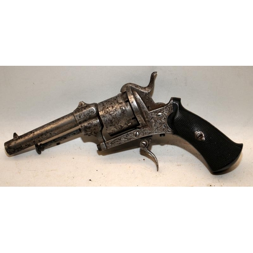 168 - Antique Six chamber revolver with functioning pull down trigger. Chamber rotates intermittently. Cer... 